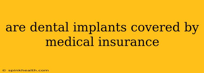 are dental implants covered by medical insurance